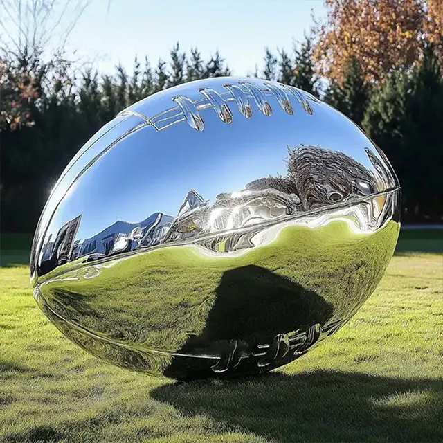 Shiny stainless steel american football statue