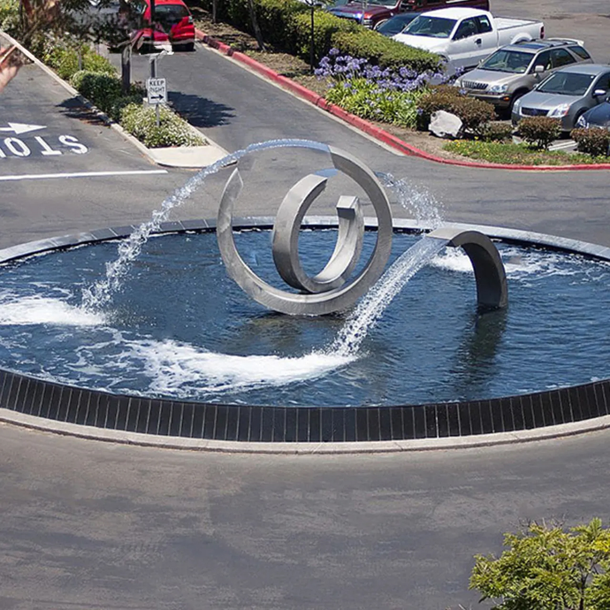 Stainless Steel Water Fountain Outdoor featuring a circular loop sculpture
