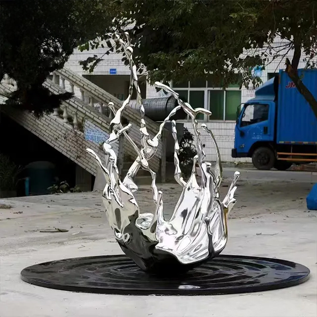 Stainless steel Abstract Water Statue featuring a mirror-finished splash design