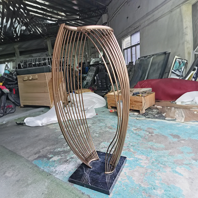 Stainless steel Metal Rod Sculpture with an open, flowing design