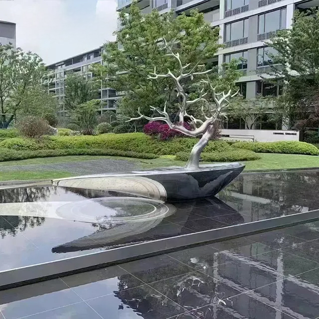 Stainless steel Pine Tree Sculpture growing from a sleek metallic boat