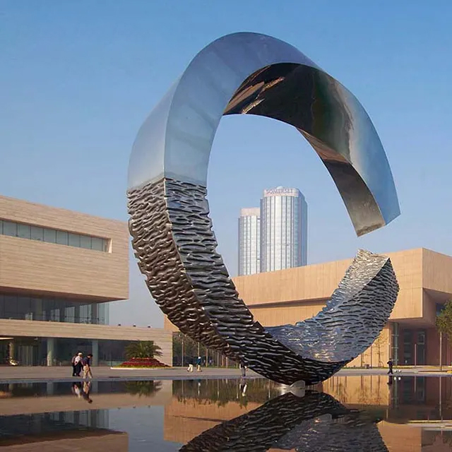 Stainless steel abstract circle sculpture with mirror finish