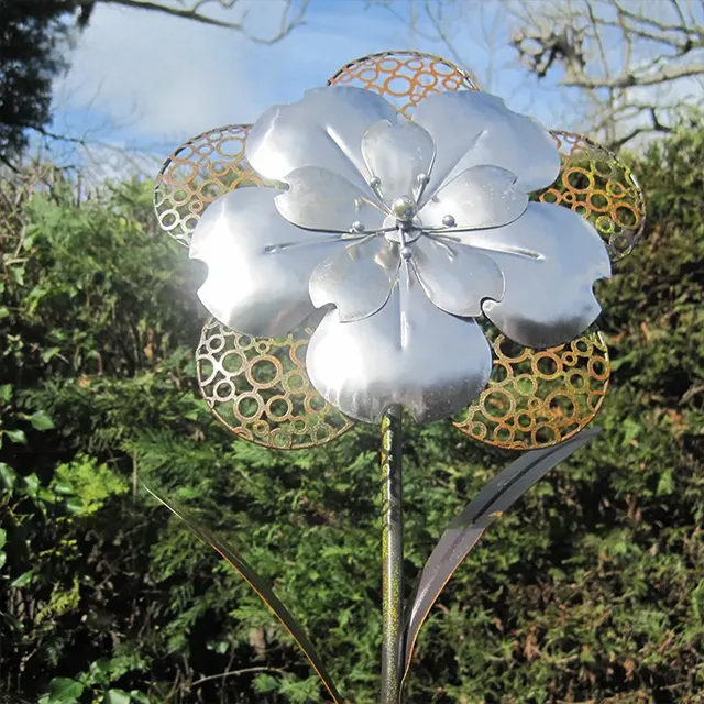 Stainless steel metal garden flower sculpture with polished petals and hollowed hole design