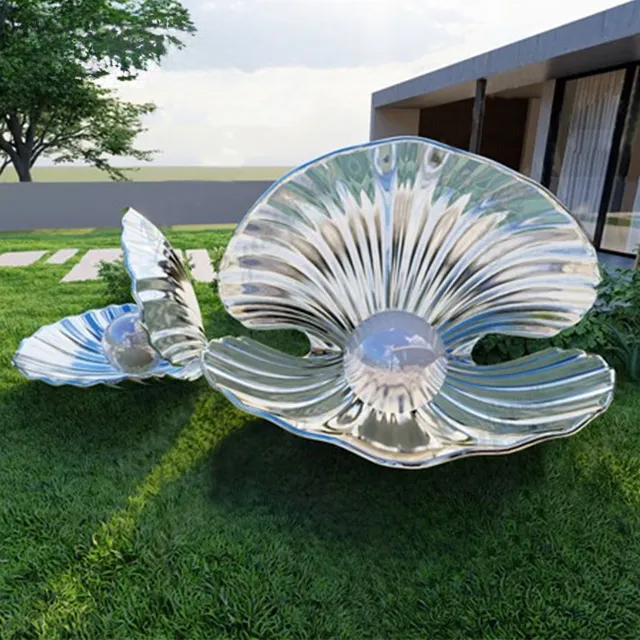 Twin stainless steel Shell Statues with pearl centers