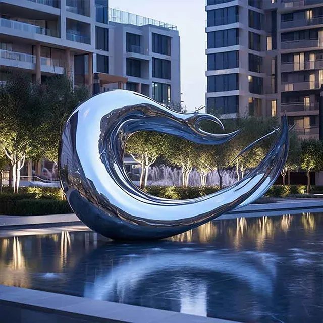 Wave sculptures for sale featuring a polished stainless steel design