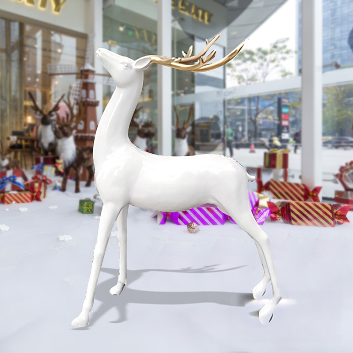 White Reindeer Statue fiberglass sculpture with golden antlers for Christmas decoration