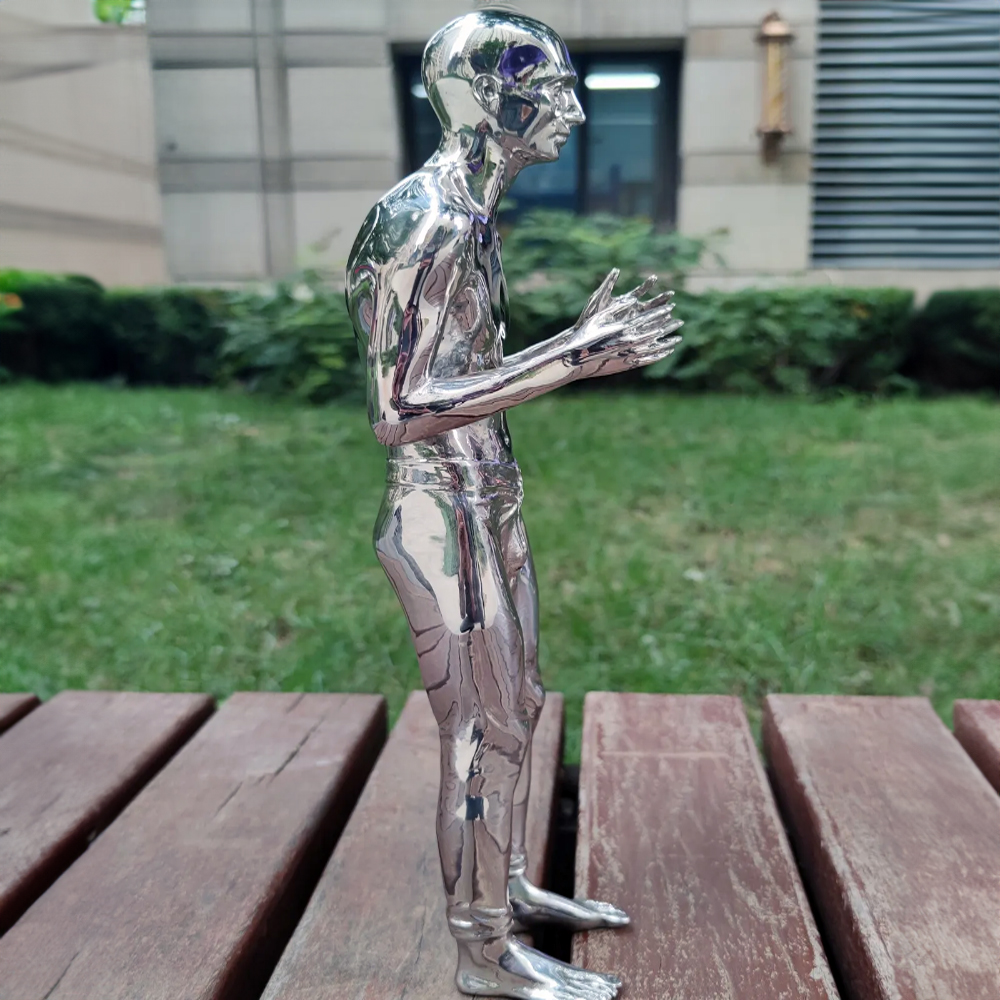 contemporary stainless steel man sculpture