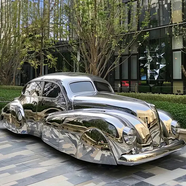 shiny stainless steel VW Beetle Statue