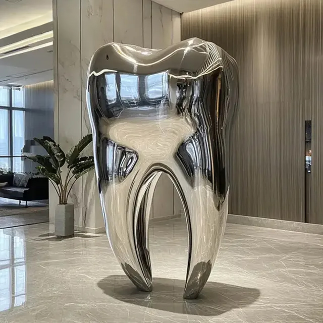 stainless steel Giant Tooth Sculpture with a mirror finish