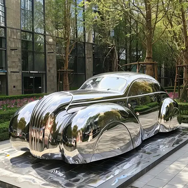 stainless steel VW Beetle Sculpture showcases smooth, rounded lines