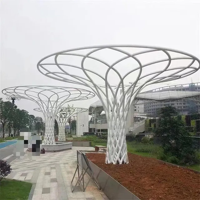 stainless steel modern tree sculpture providing decorative shade
