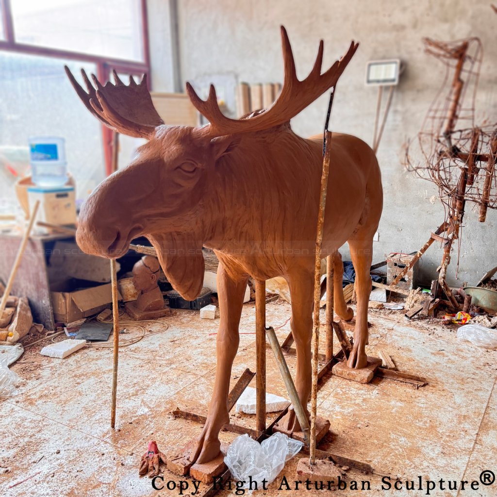 4-clay mold of moose statue