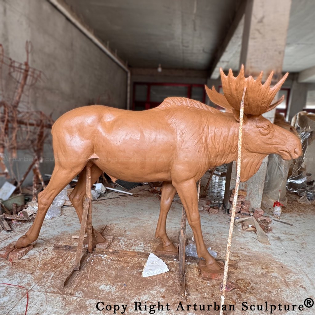 8-clay mold of large moose garden sculpture