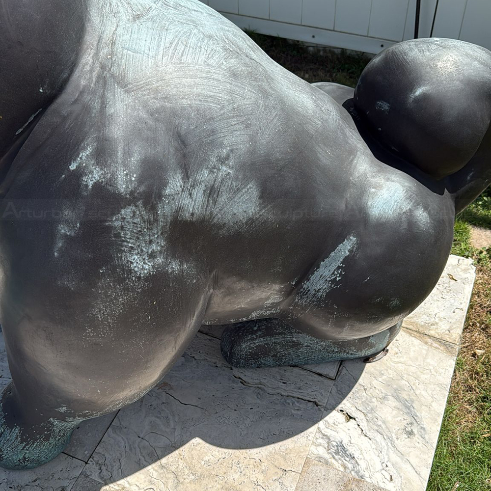 Bronze-fat-dog-statue-surface-with-green-patina