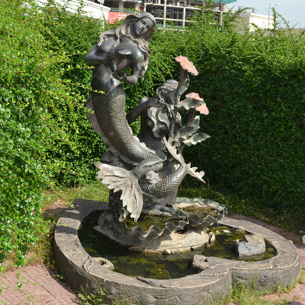 Bronze mermaid fountains with two mermaids