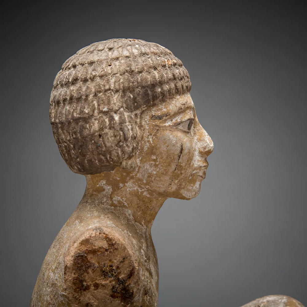 Close-up of an Egyptian figure sculpture head