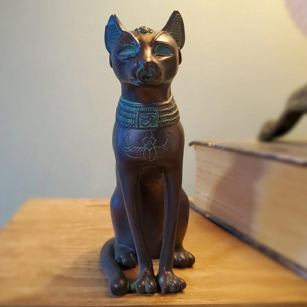 Egyptian Bronze Cat sculpture showing scarab motif on chest
