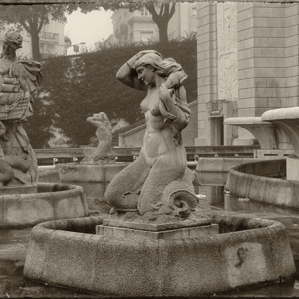 Mermaid fountains statues at Fonte Luminosa in Lisbon (1)