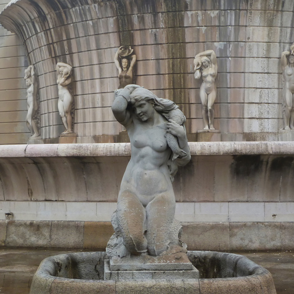 Mermaid fountains statues at Fonte Luminosa in Lisbon (2)