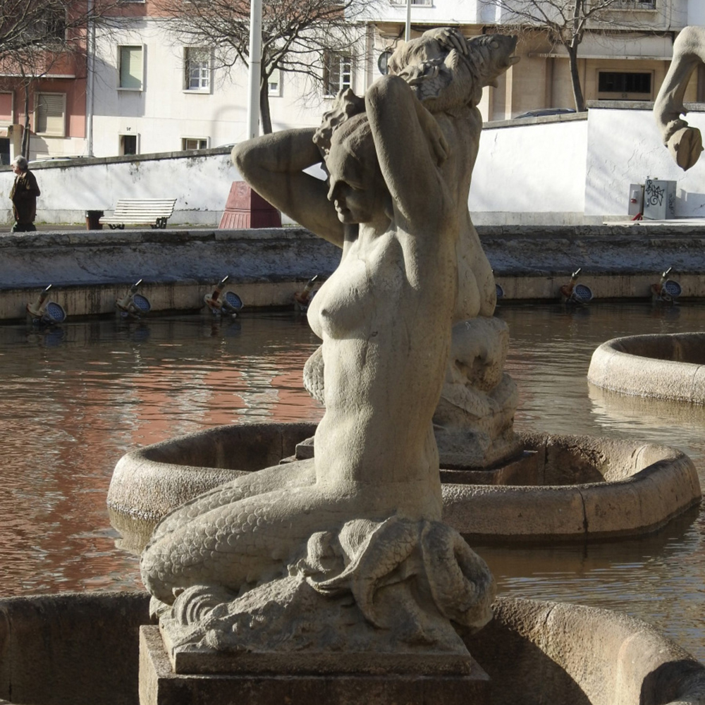Mermaid fountains statues at Fonte Luminosa in Lisbon (5)