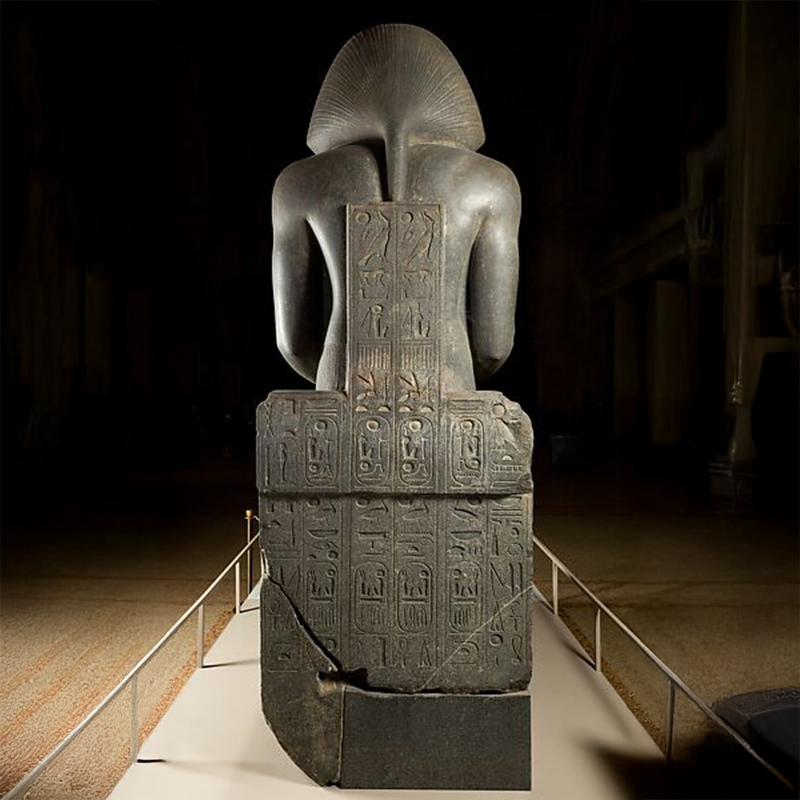 Profile view of Seated Pharaoh Statue