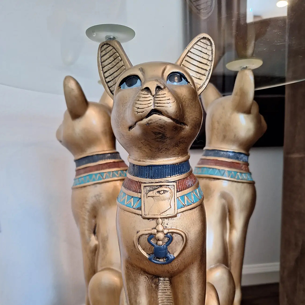 fiberglass Bastet cat sculpture with golden finish