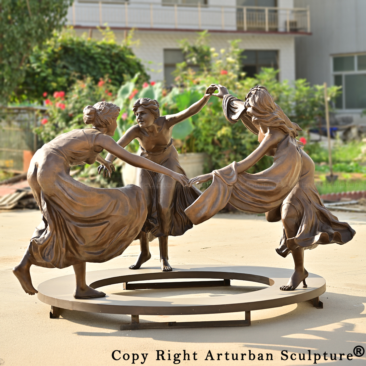 0-Three bronze dancing maidens