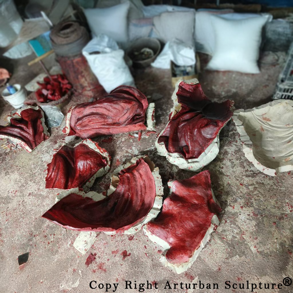 5-wax mold of the three ladies statue