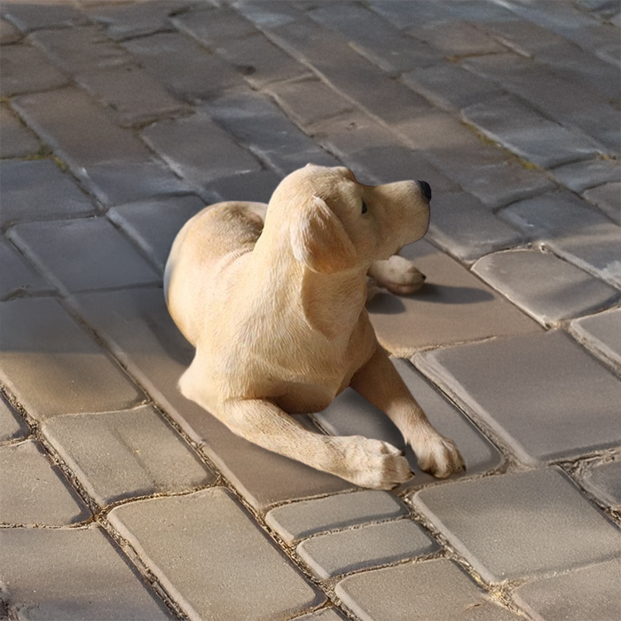Life size yellow lab statue on patio