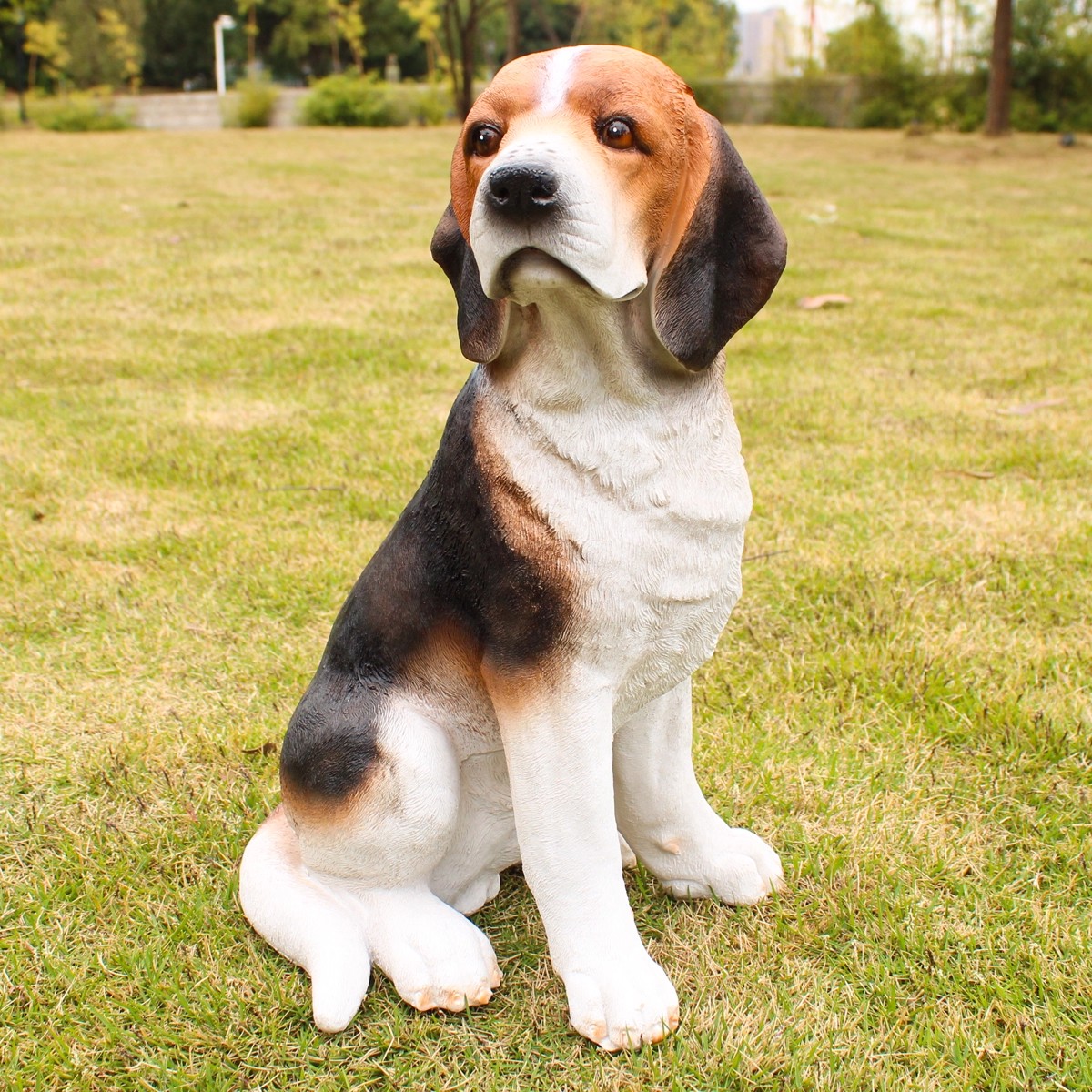 Lifelike Beagle Lawn Statue sitting in garden