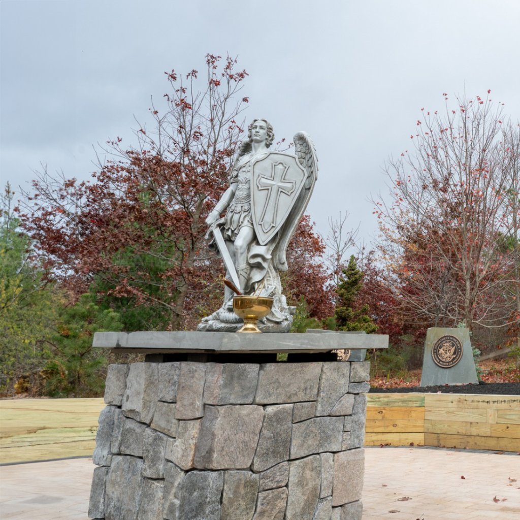 14-4 St Michael statue on stone pedestal