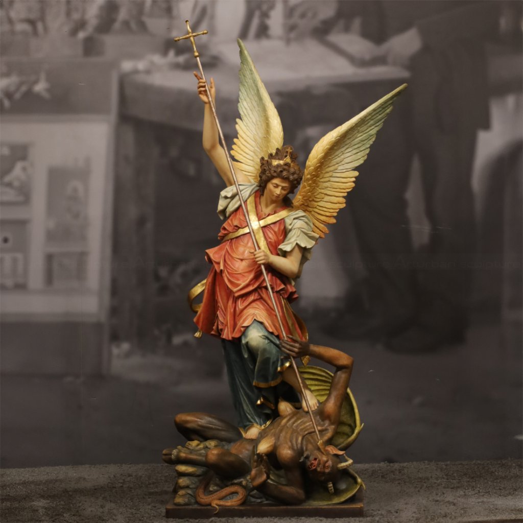 2 St Michael strikes demon figure statue