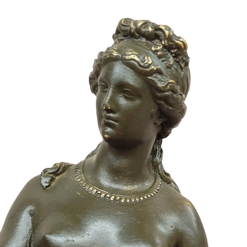 bronze Venus and Cupid Statue face close-up