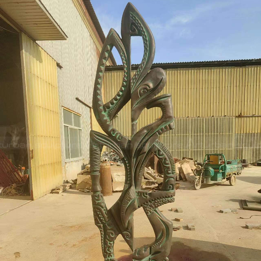 Bronze sculpture with green patina