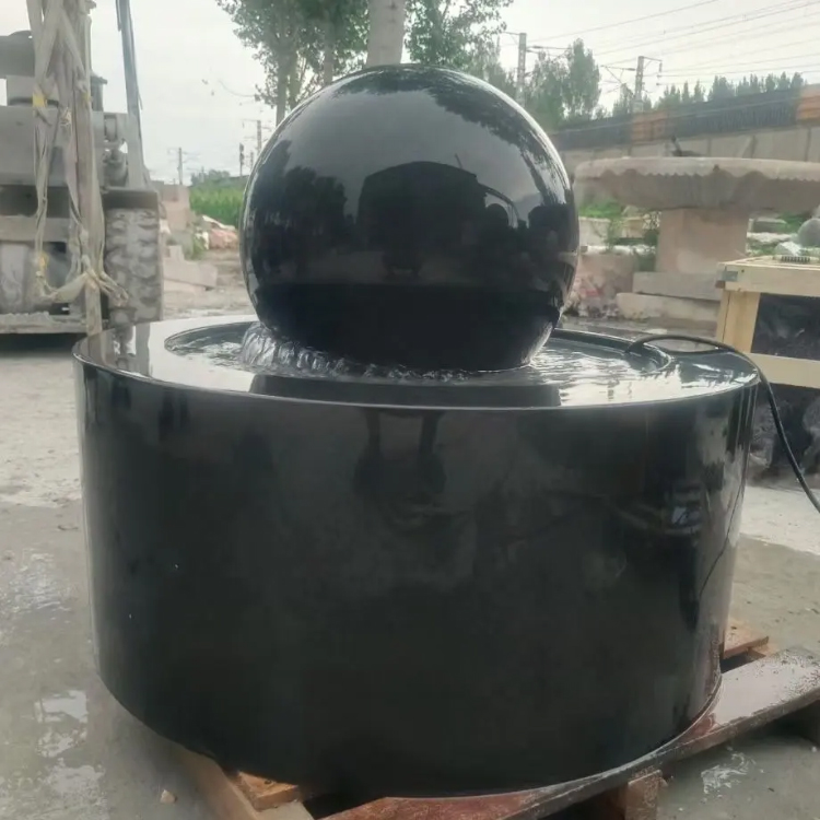 Polished Stone Ball Water Fountain feature
