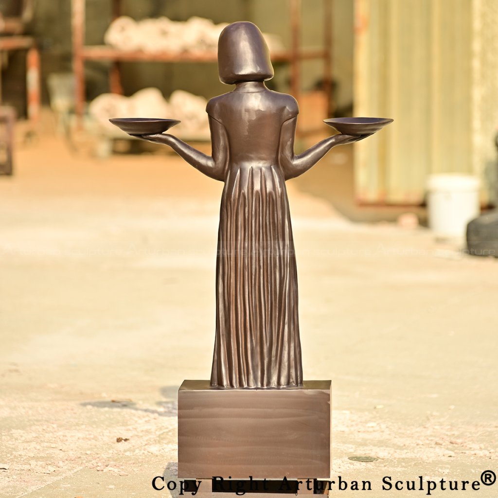 Savannah bird girl statue replica back view