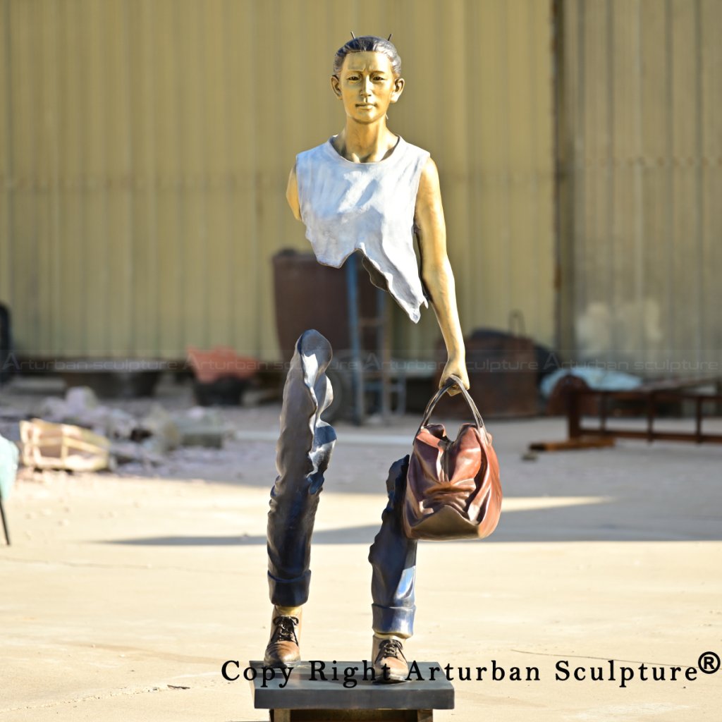 0-Female the traveler sculpture walking with suitcase
