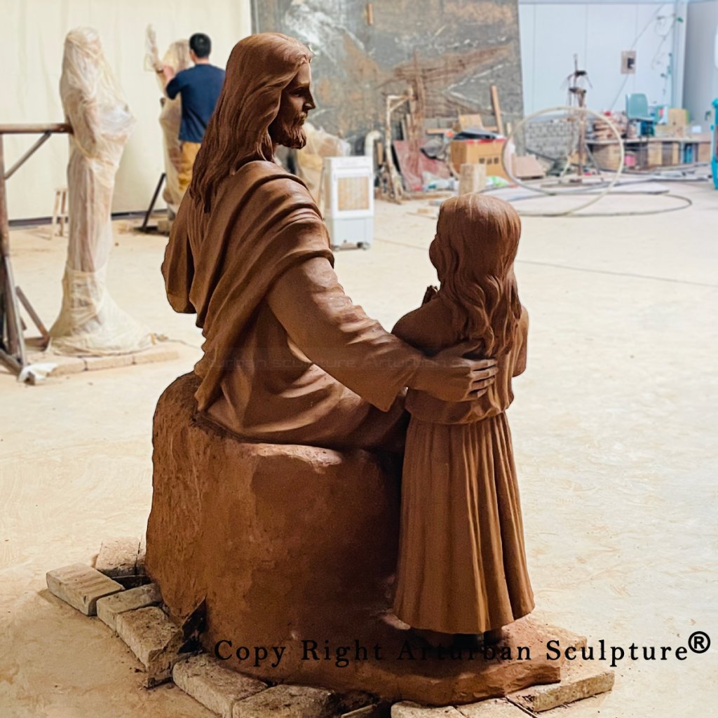 5.2 clay mold of jesus and children sculpture