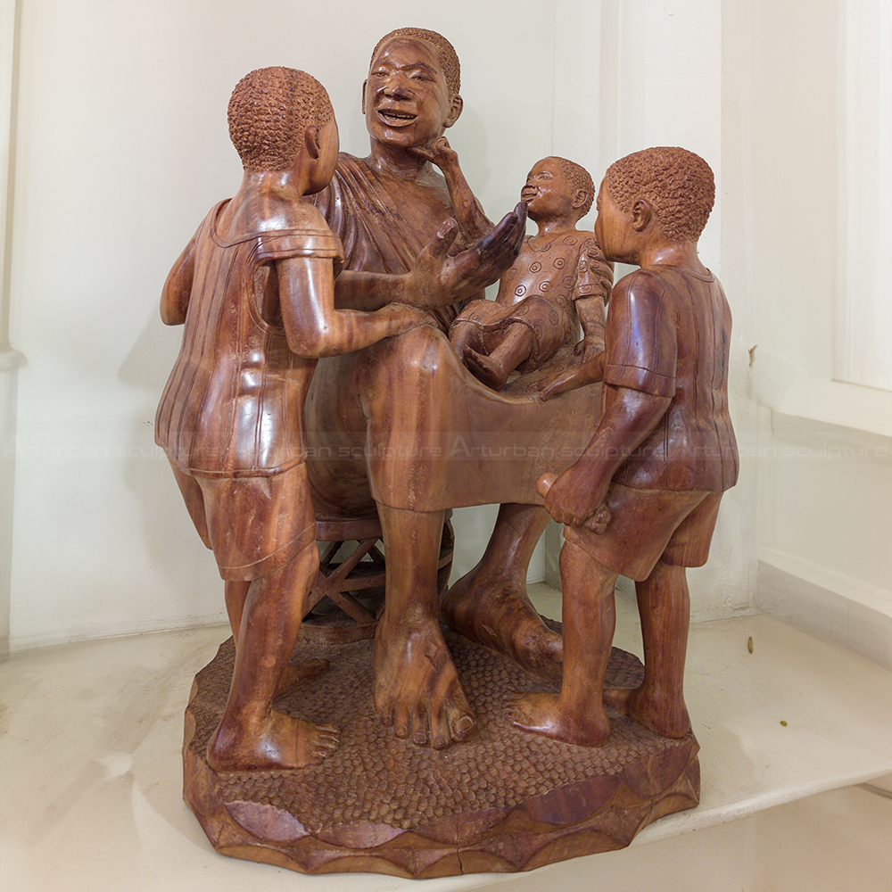 African style statue of christ with children