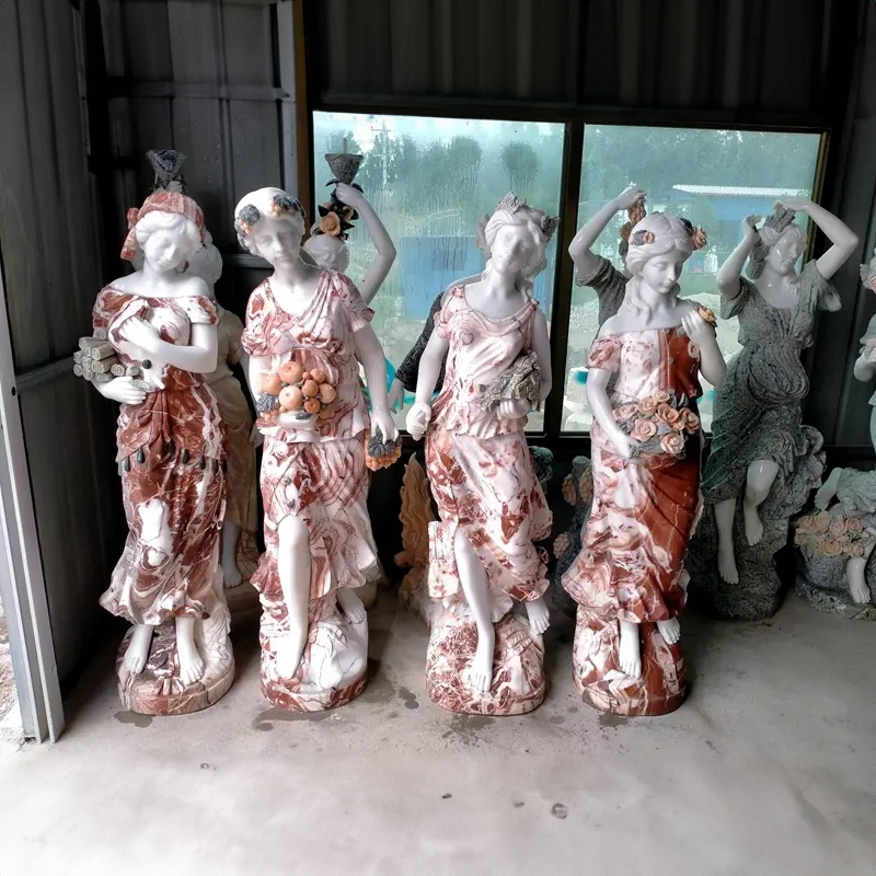 Four Seasons Statues in marble display.