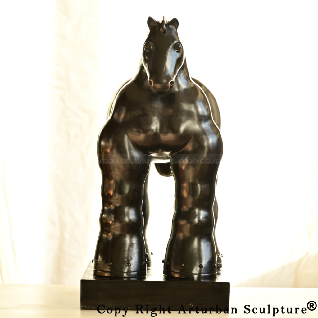 Frontal view of a stylized Fat Horse Statue made of copper