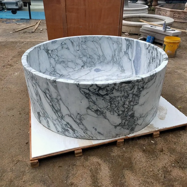 Round Stone Bathtub with natural marble veining