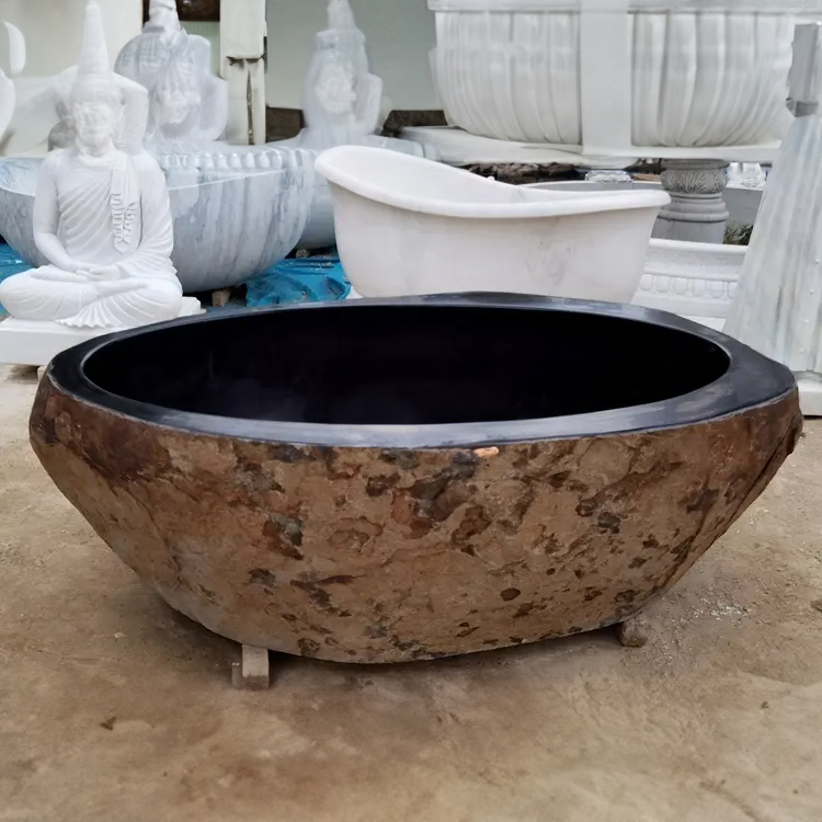 Solid Natural Stone Freestanding Bath rustic stone finish