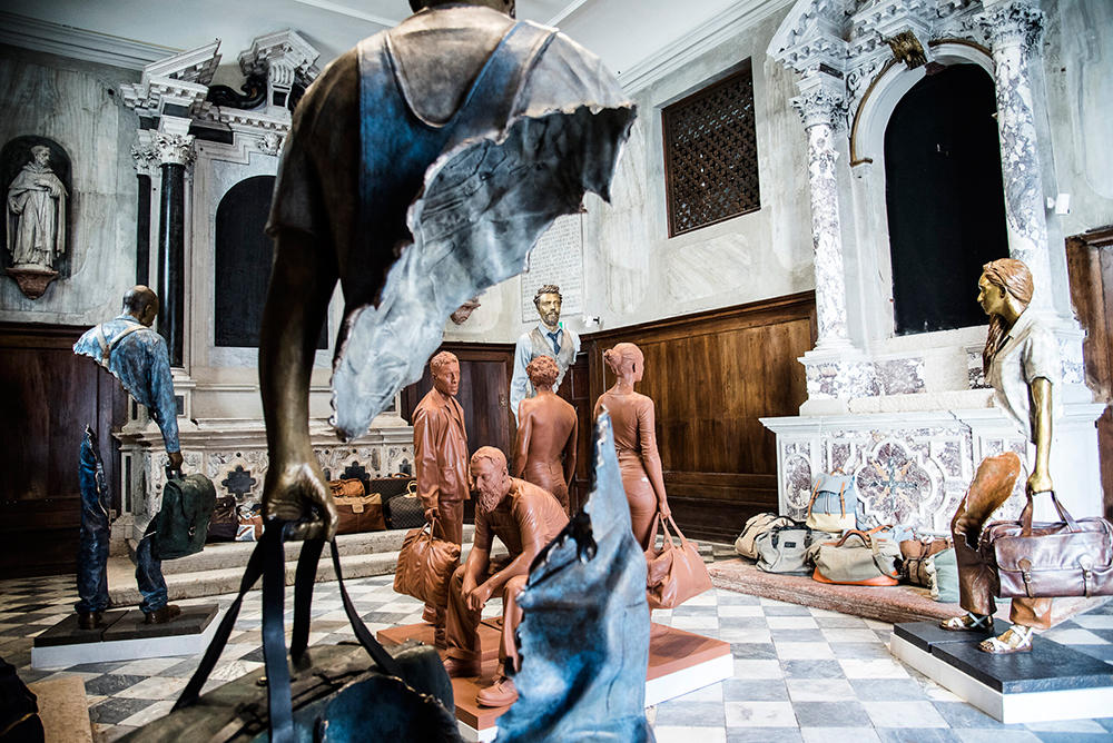 Traveler sculptures installation church exhibition space