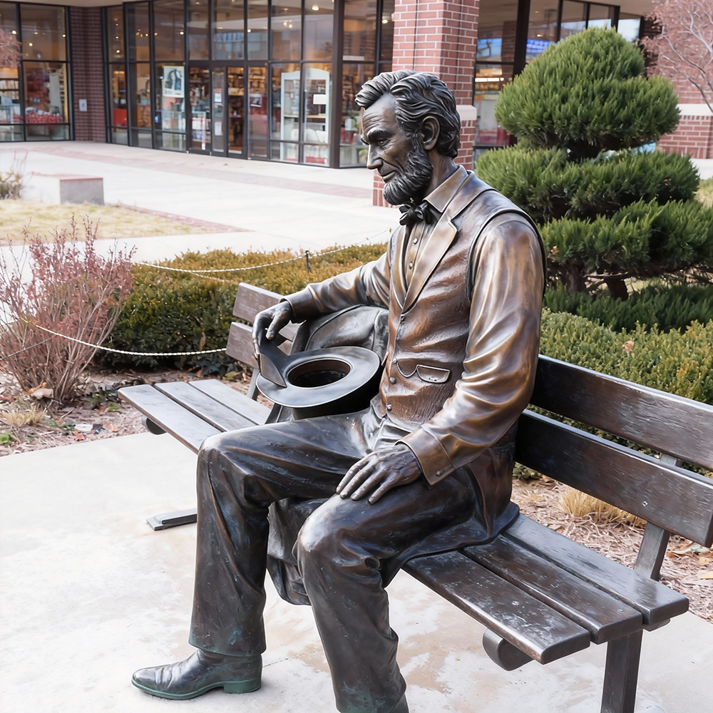 Abraham Lincoln Bronze Statue full figure on outdoor bench