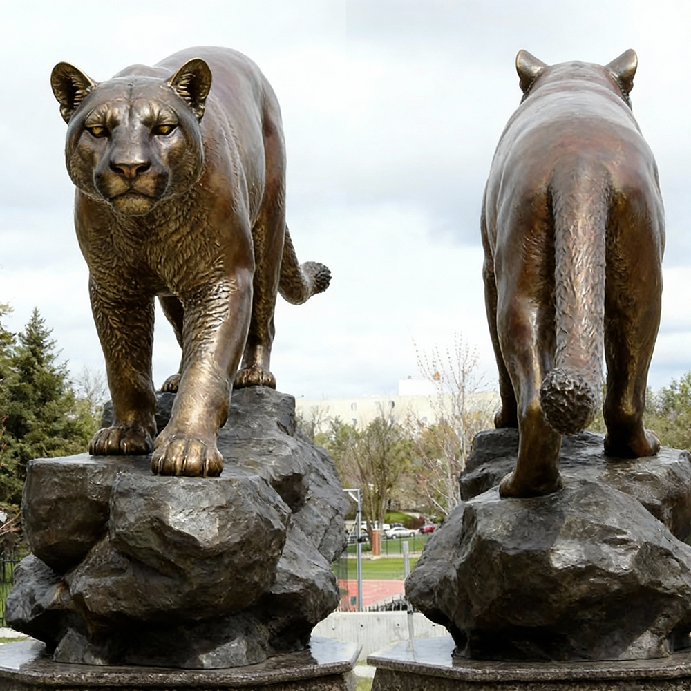 Bronze Puma Sculpture back view with textured tail and hind legs