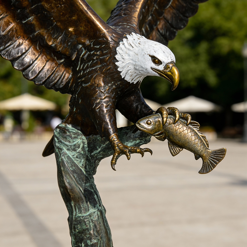 Bronze bald Eagle catching fish Statue for Sale