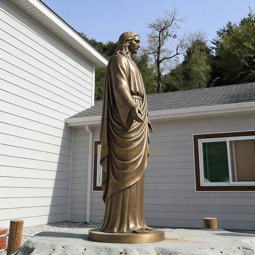 Jesus Statue Bronze side view outdoor scene