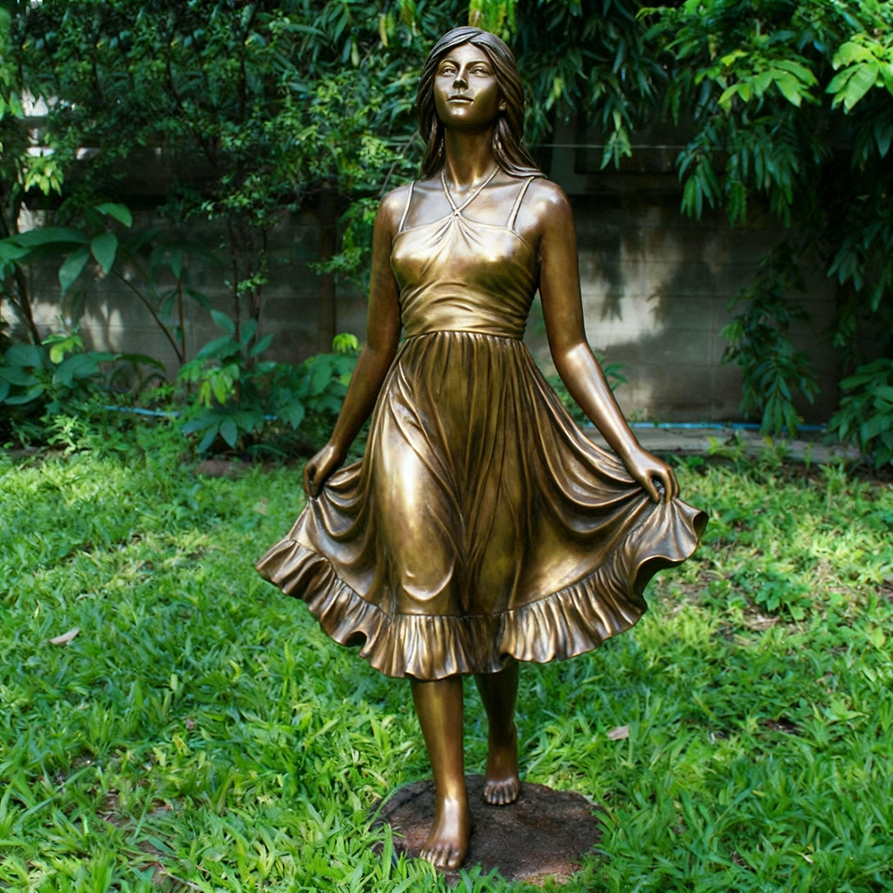 Life Size Female Statue in gentle walking pose