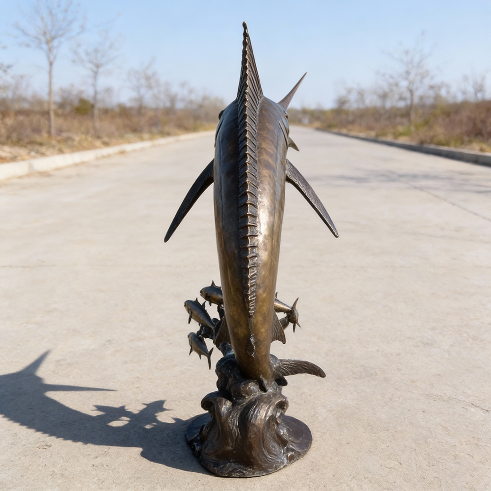 Rear view marlin fish sculpture with dorsal fin